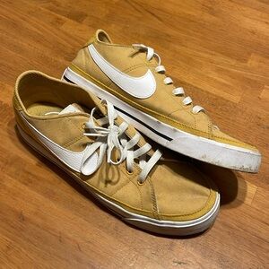 Nike court canvass shoes. Barely worn.